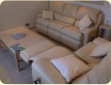 Luxurious cream leather sofas with recliners